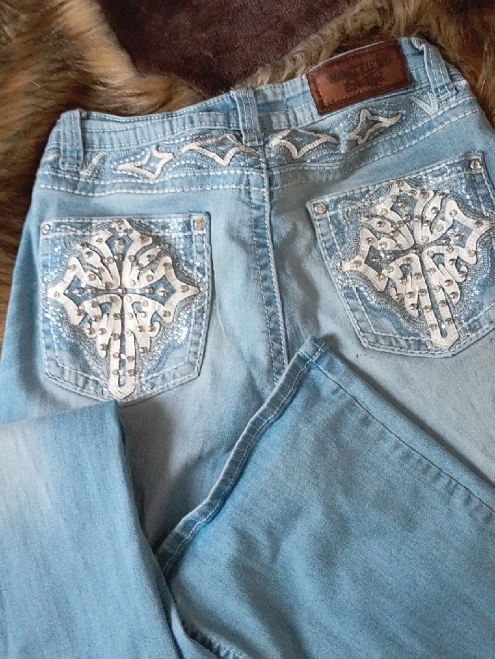 Embellished Light Blue Boot Cut Jeans with Rhinestone Back Pockets